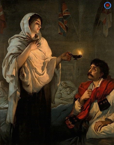 Florence Nightingale với cây đèn dầu bên giường bệnh.